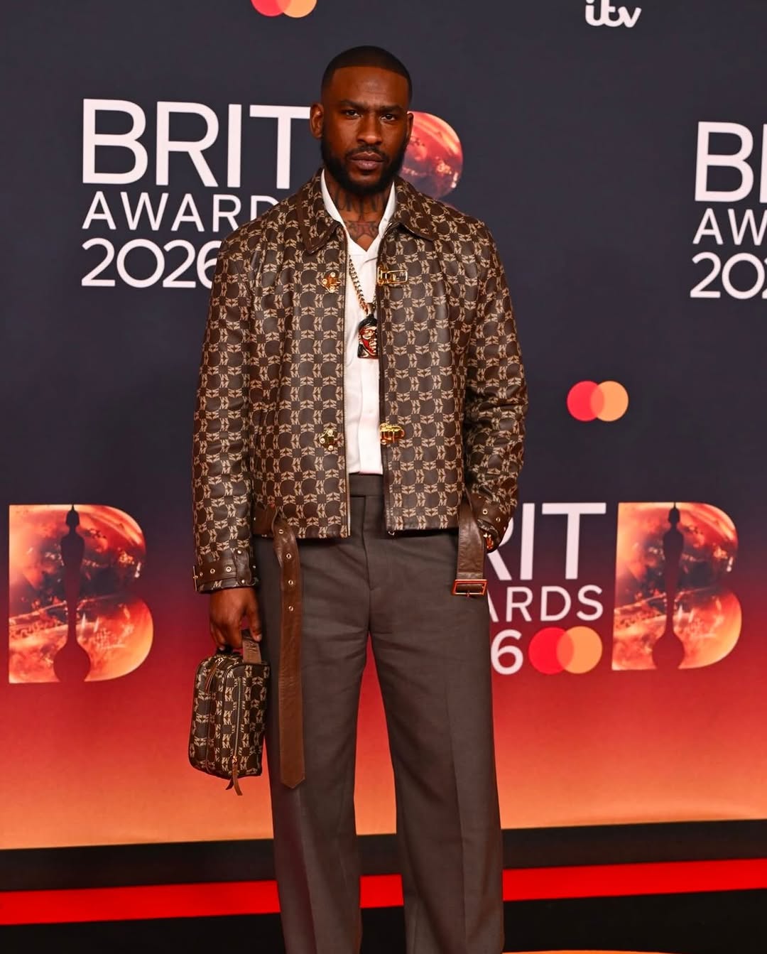 SKEPTA STEPPED ONTO THE BRIT AWARDS CARPET IN A FULL LOOK FROM MAINS SS25 — HIS OWN FASHION LABEL